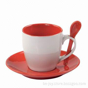Stoneware cup and saucer with spoon